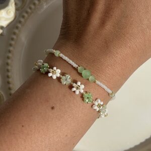 White floral bracelet set with green glass beads