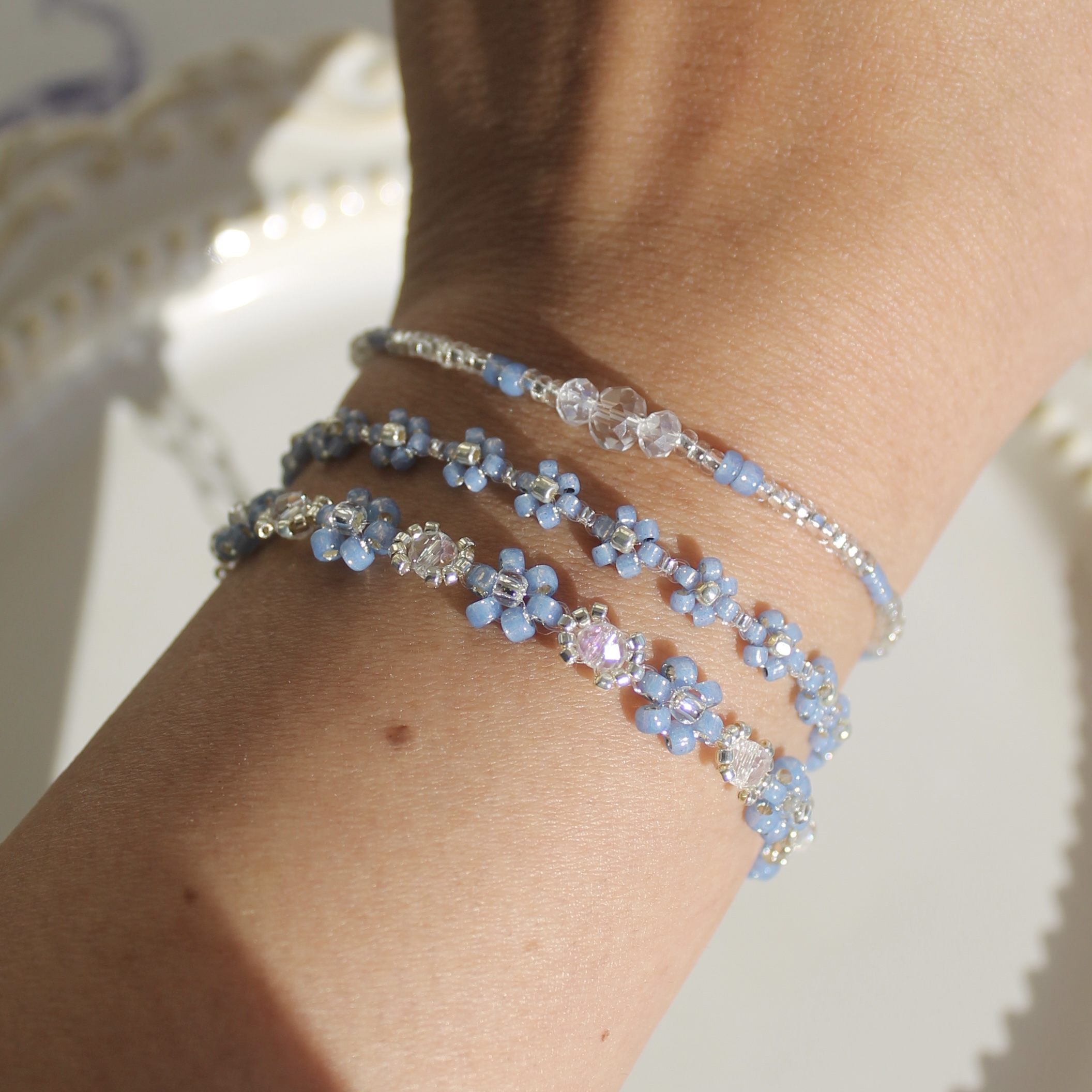 Deep blue floral bracelet set with Japanese seed beads and silver details