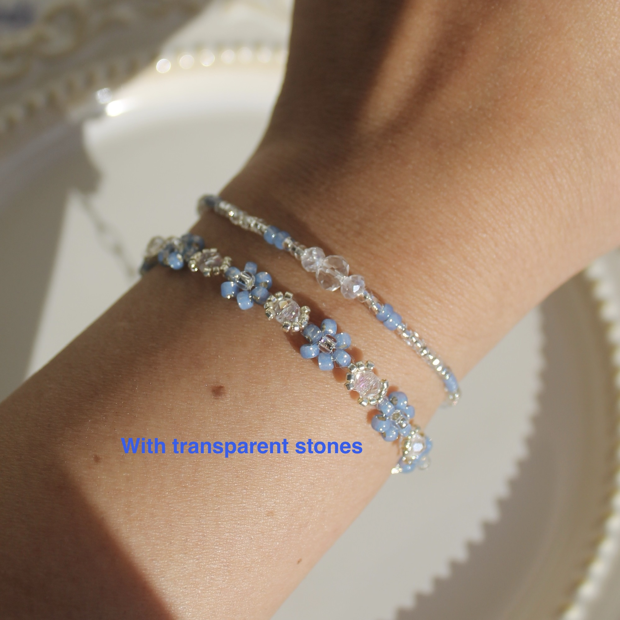 Denim blue flower bracelet with clear sparkling glass beads